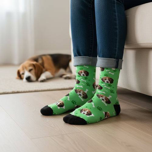 Green custom dog socks with a beagle puppy face print, worn on real feet at home