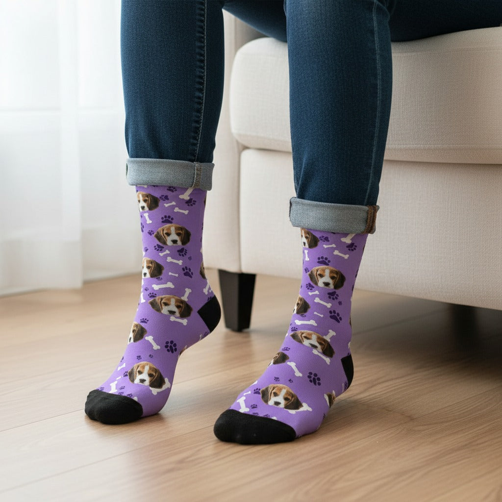 Purple custom dog socks with a beagle puppy face print, worn on real feet at home
